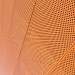 橙色穿孔铝板为什么会被用在建筑外立面呢
