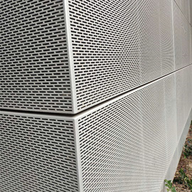 图案穿孔铝板为幕墙建筑增添的艺术效果